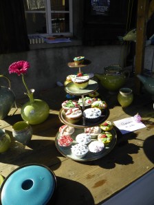 This stand had some beautiful pottery and yummy looking cupcakes!